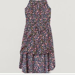 H&M’s Romper With Dress Cape .